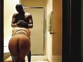 Wearing black lingerie a busty nipple polishes her pussy